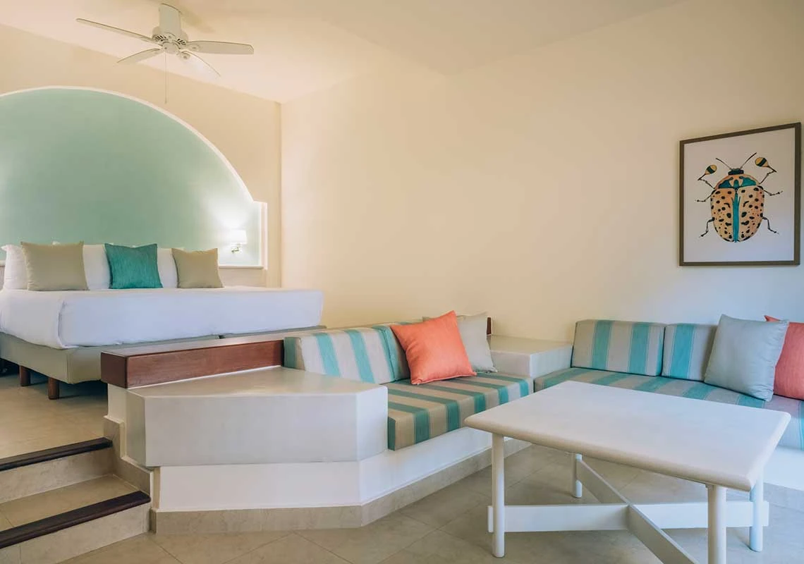 Iberostar Selection Bávaro Suites · exemple de chambre avec coin salon